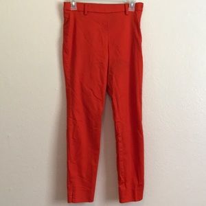 Orange pants. Size 4, but more like a size 2.